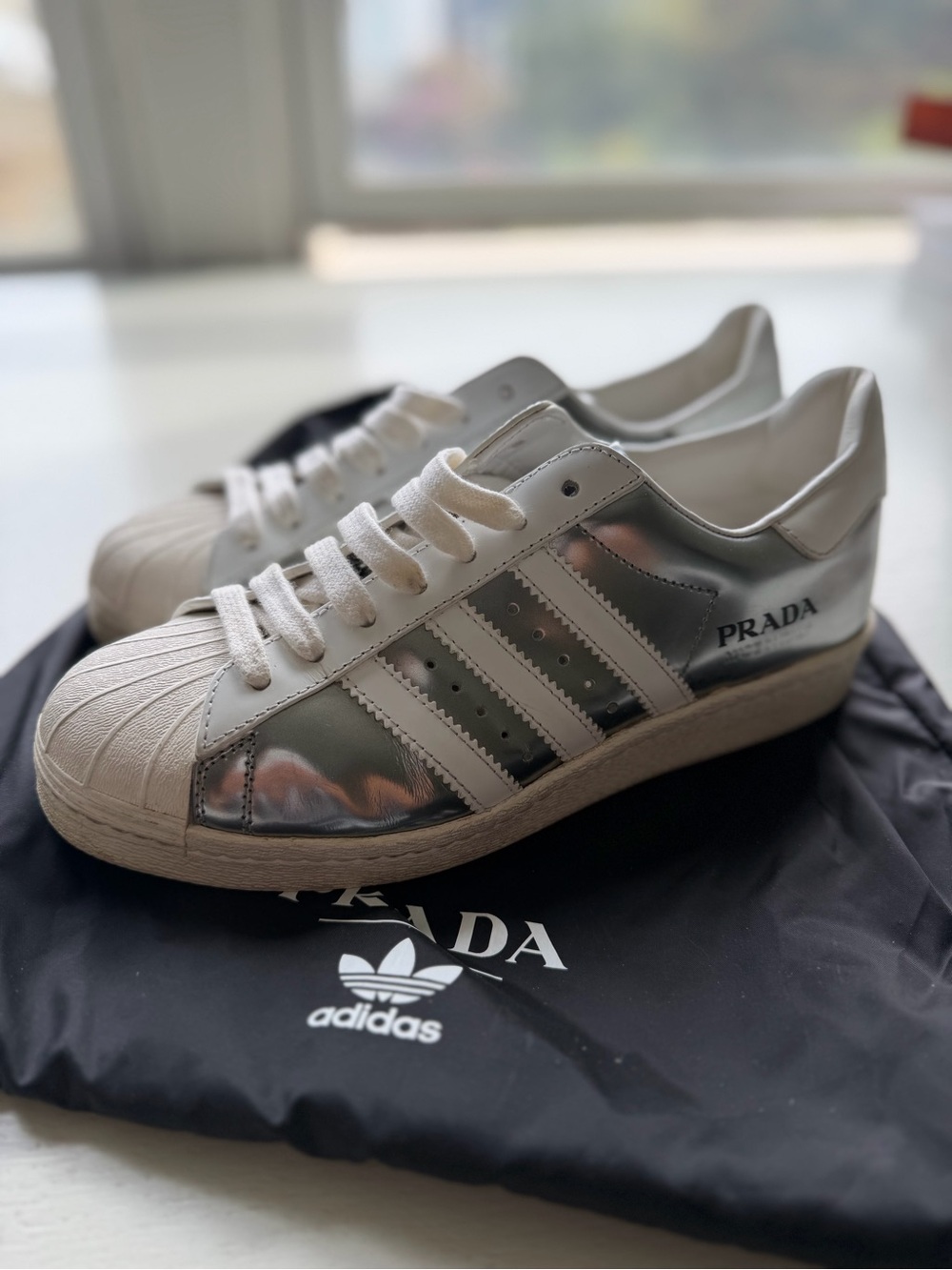 Prada x adidas Superstar Silver Sneakers (Women’s 7 / Men’s 6)